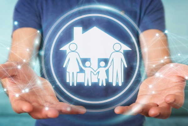 Ein Piktogramm einer Familie vor einem Haus
